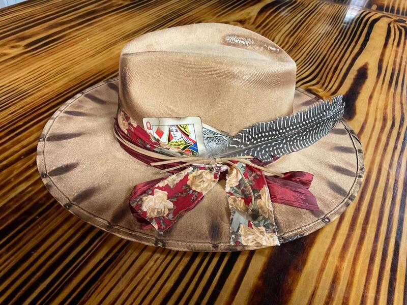 Rebelde Brown hat with feathers and floral hat band details by YeeHaTx